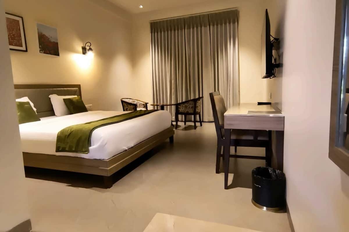 Economy Room, Balcony, Garden View | In-room safe, desk, laptop workspace, free WiFi