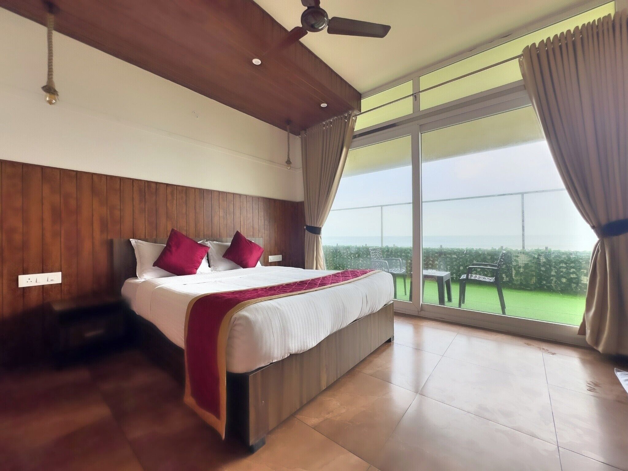Ground Floor - Sea View Deluxe Room | Desk, laptop workspace, blackout drapes, soundproofing