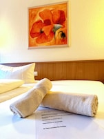 Roupas de cama premium, edredons de pluma, frigobar, cofres nos quartos
