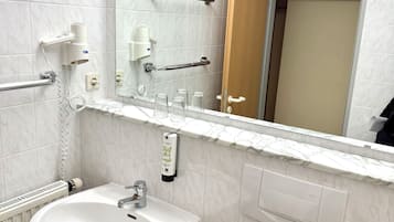 Hair dryer, slippers, towels, soap