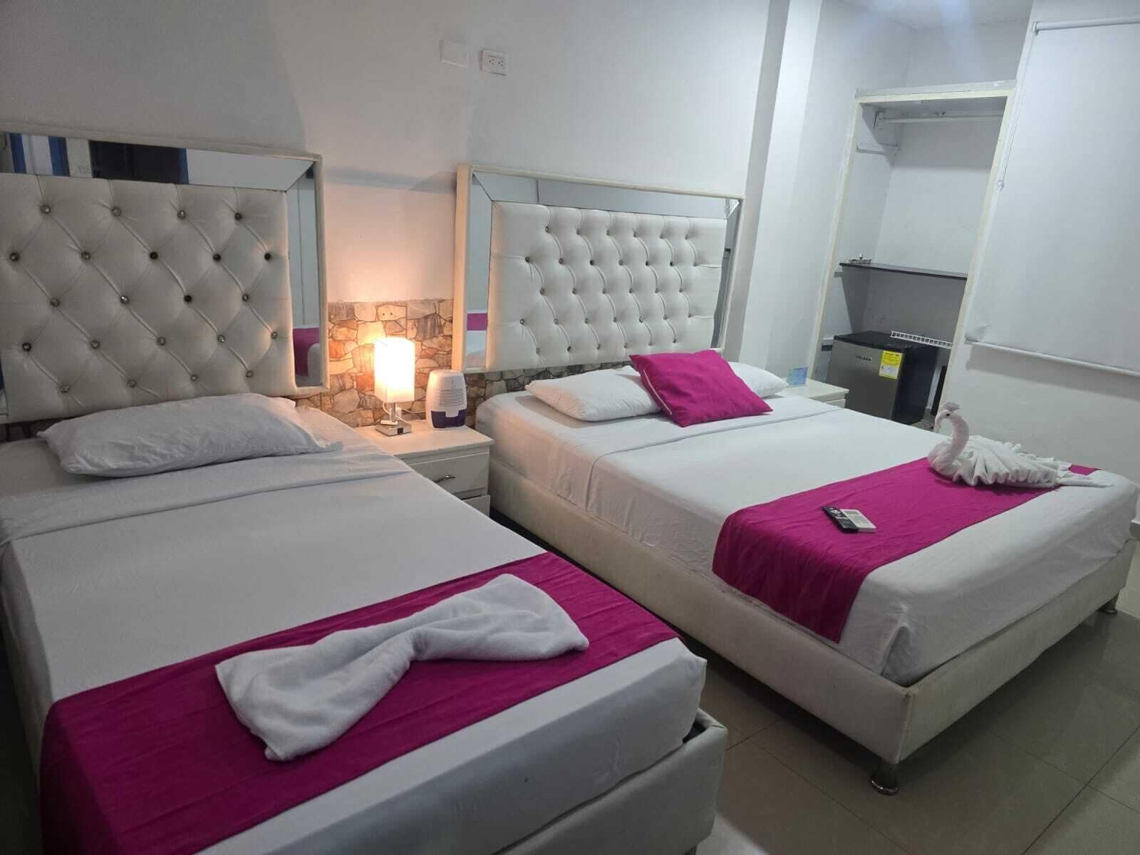 Kamar Triple Basic | Setrika/meja setrika, Wi-Fi gratis, dan seprai linen