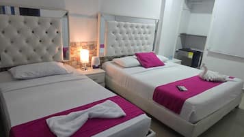 Kamar Triple Basic | Setrika/meja setrika, Wi-Fi gratis, dan seprai linen