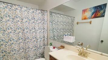 Hair dryer, towels, soap, toilet paper