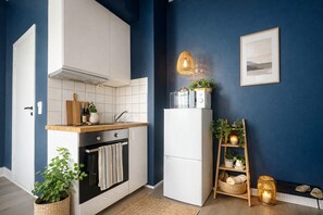 Geladeira, fogão, cooktop, cafeteira/chaleira