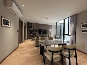 Comfort Apartment, 2 Bedrooms, Non Smoking, Kitchen | Living area | 60-inch flat-screen TV with digital channels, Netflix - The Lumi Apartments by XOI Residences (Tay Ho)