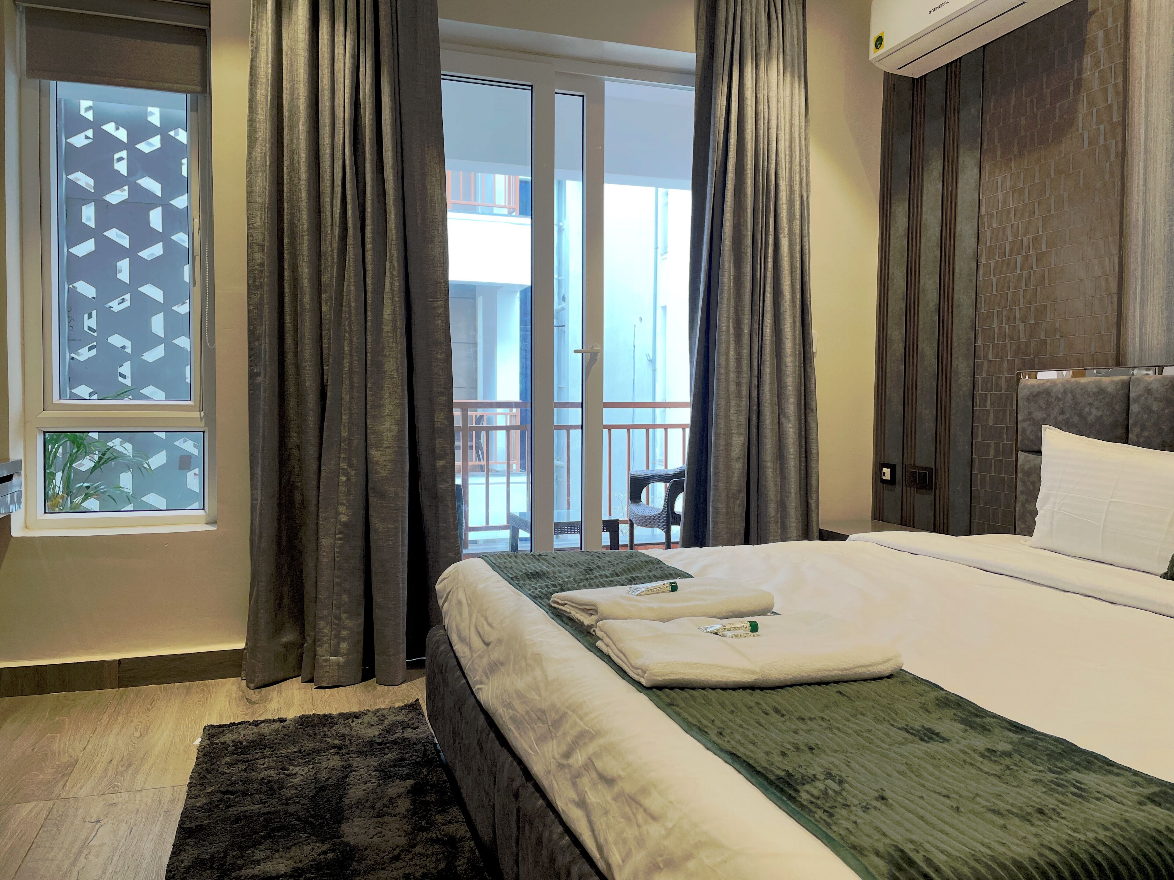 Standard Apartment, Balcony, Garden View | Desk, laptop workspace, blackout drapes, soundproofing