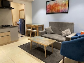 Standard Apartment, Balcony, Garden View | Desk, laptop workspace, blackout curtains, soundproofing - Rohm Staycations (Gopalpur)