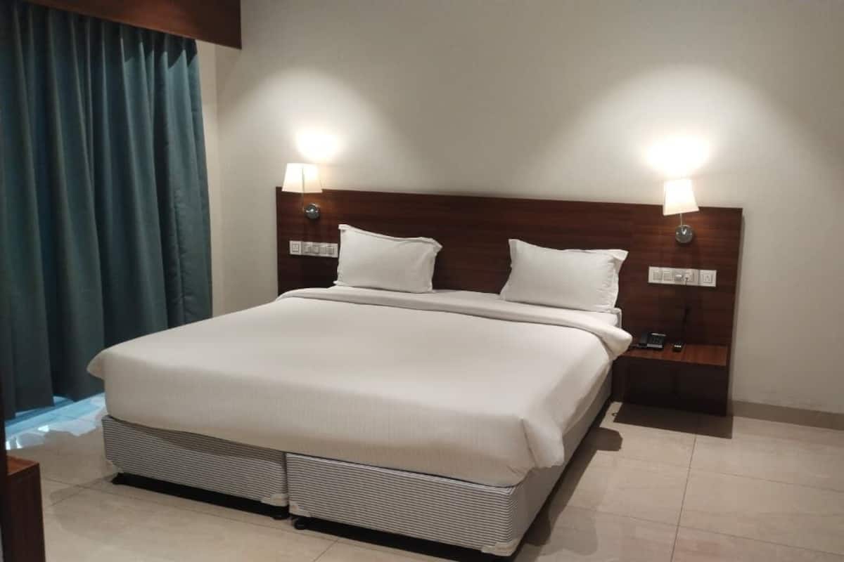 Desk, laptop workspace, blackout curtains, iron/ironing board