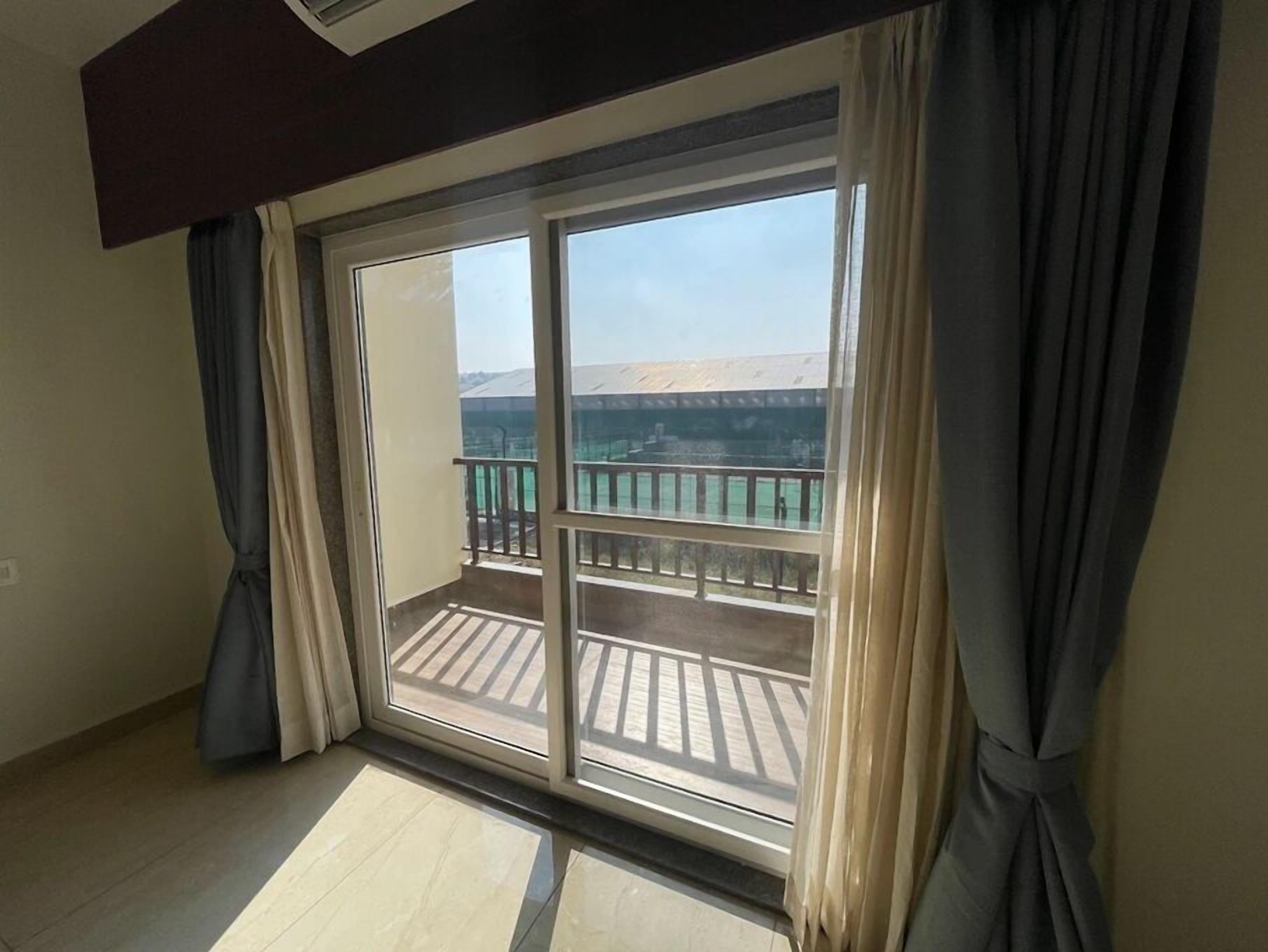 Desk, laptop workspace, blackout drapes, iron/ironing board