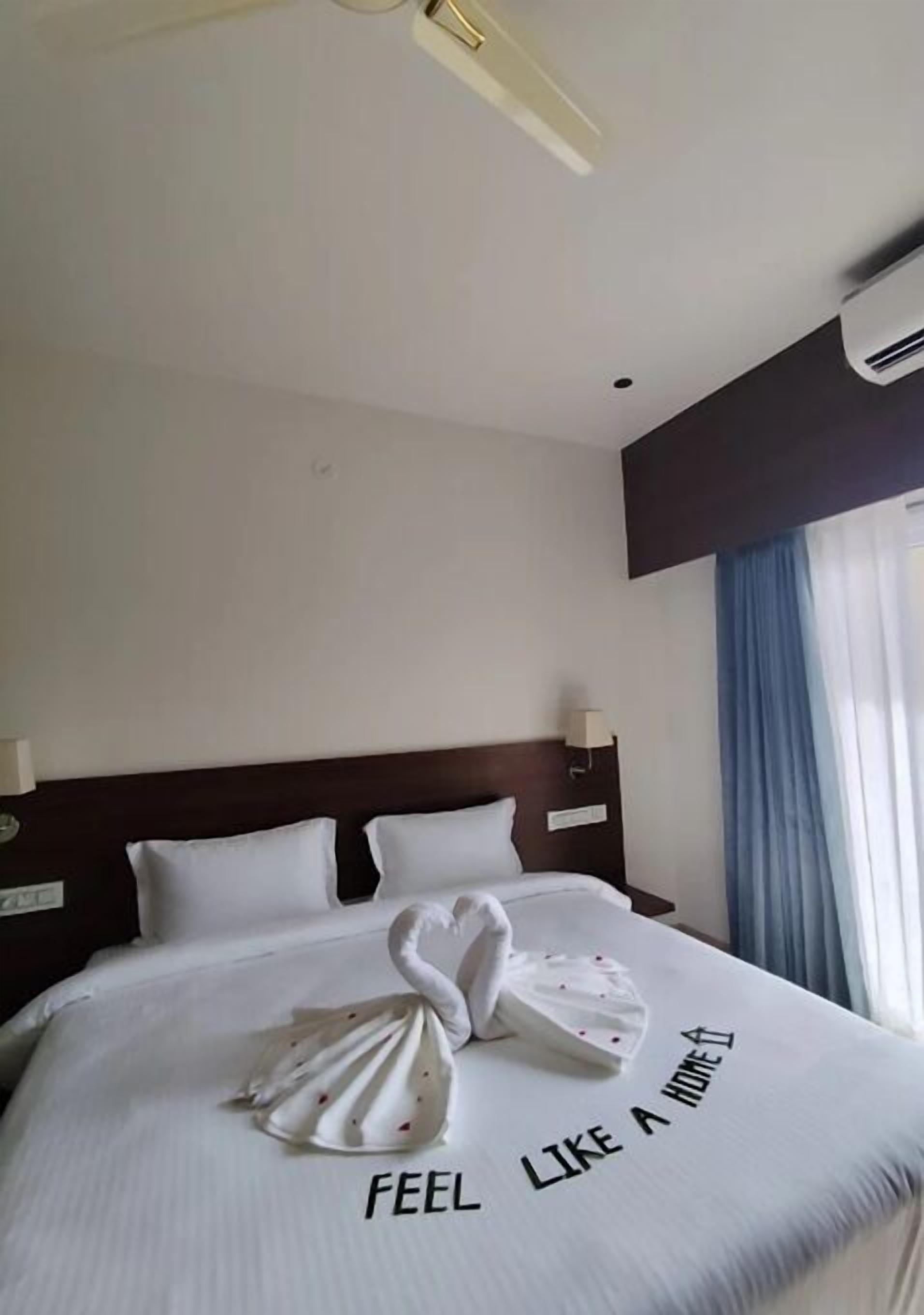 Desk, laptop workspace, blackout curtains, iron/ironing board