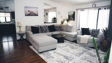 Smart TV, fireplace, foosball, books