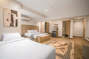 Family Suite, City View | In-room safe, blackout curtains, iron/ironing board, free WiFi