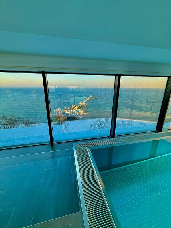 Indoor pool, a heated pool - Exclusive beach shell vacation apartment with sauna and pool. (Sellin)