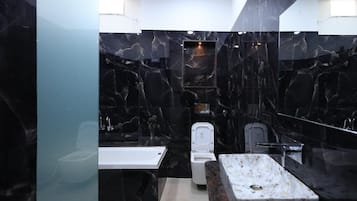 Separate bathtub and shower, hair dryer, towels, soap