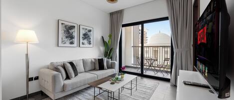 Appartamento Deluxe, 1 camera da letto, balcone, vista città | Soggiorno