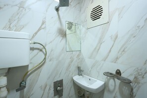 Deluxe Room Non AC | Bathroom