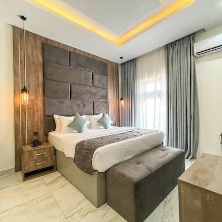 Deluxe Room, Balcony, City View | Desk, laptop workspace, blackout drapes, free WiFi. Ejiworld Hotel