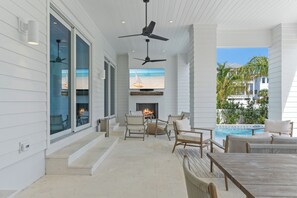Outdoor dining - The Palm 30a Opulent 7bdrm home Steps from the Beach. Golf cart, heated pool. (Inlet Beach)