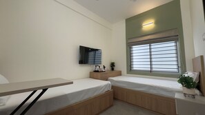 Standaard Twin kamer | Een laptopwerkplek, een strijkplank/strijkijzer, gratis wifi