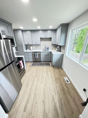 Fridge, microwave, oven, stovetop - Burien Luxury 3BR Apartment | 4BD, Sleeps 8 | Pet+ (Burien)