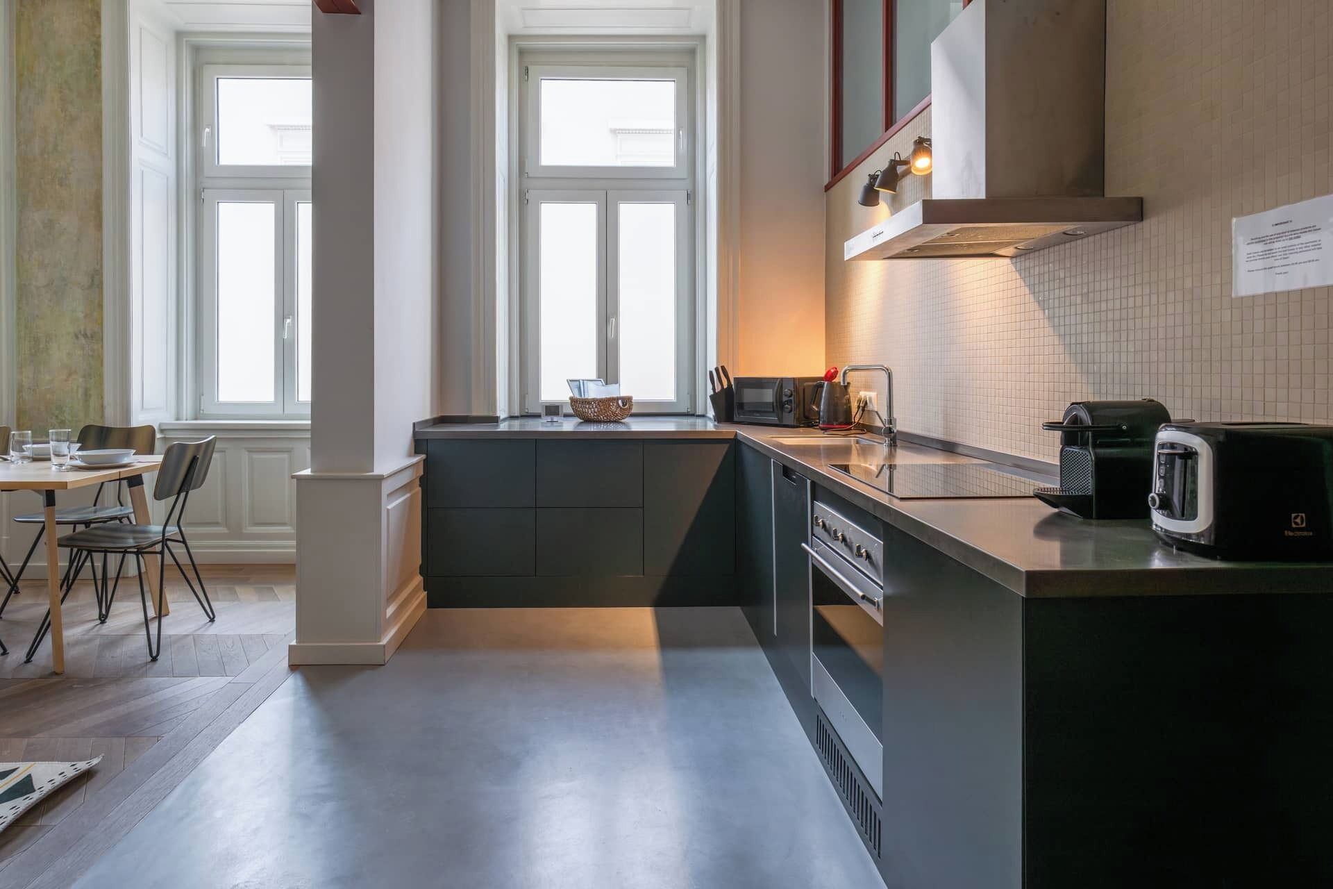 Apartment, City View | Private kitchen | Dining tables