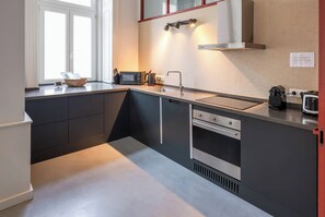 Lägenhet - utsikt mot staden | Eget kök | Matbord