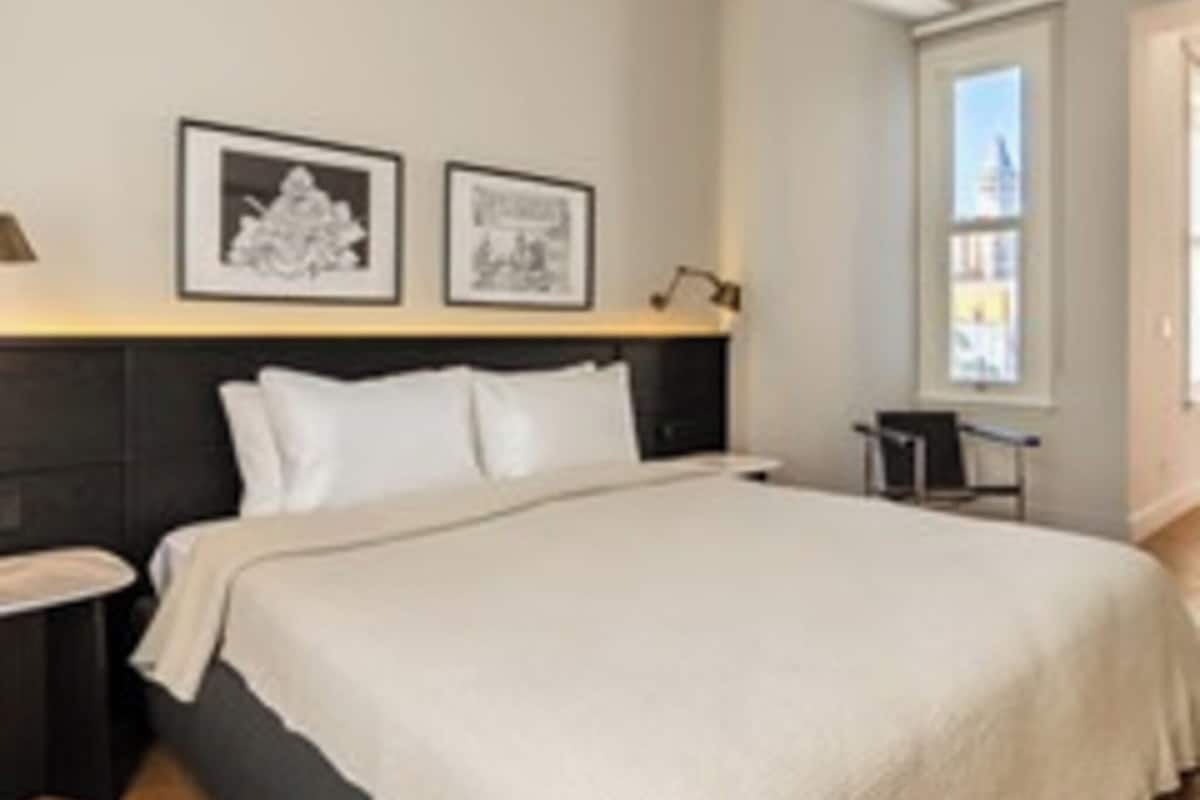 Egyptian cotton sheets, premium bedding, memory-foam beds, free minibar