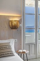 Double Room with Sea View | Minibar, desk, laptop workspace, iron/ironing board