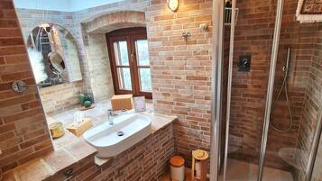 Hair dryer, bidet, towels, soap