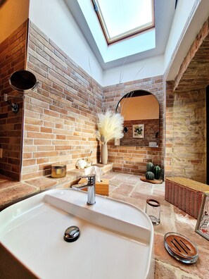 Hair dryer, bidet, towels, soap