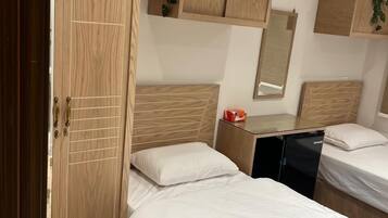 Quarto casal luxo | Frigobar, escrivaninha, Wi-Fi de cortesia, roupa de cama