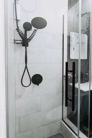 Shower, hair dryer, towels, soap