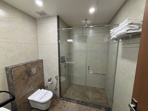 Shower, rainfall showerhead, designer toiletries, hair dryer