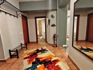 55-inch LED TV with digital channels - Bălcești apartments - Pumo Properties (Bucharest)