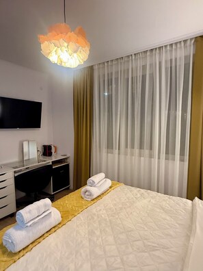 2 slaapkamers, een bureau, een strijkplank/strijkijzer, gratis wifi