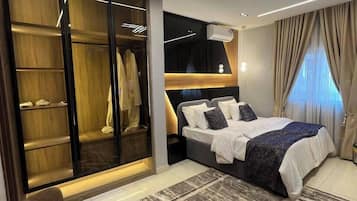 Deluxe Room, Balcony, City View | Desk, laptop workspace, blackout drapes, soundproofing