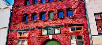 Cozy semi-detached house with fireplace and terrace close to the Baltic Sea