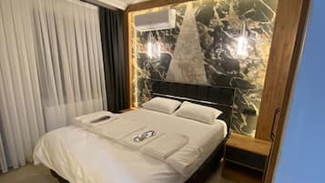 Deluxe studio suite, 1 tweepersoonsbed, balkon | Gratis wifi