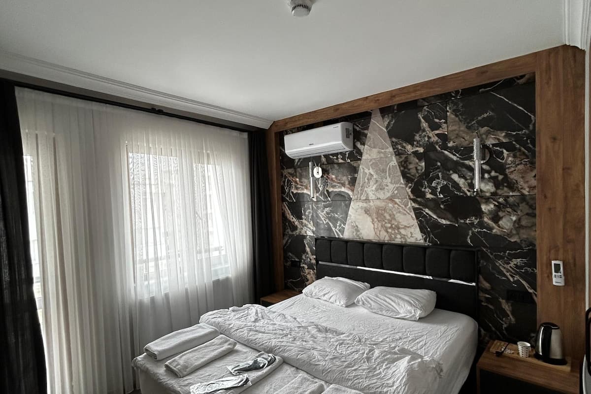 Suite estudio Deluxe, 1 cama matrimonial, balcón | Wifi gratis