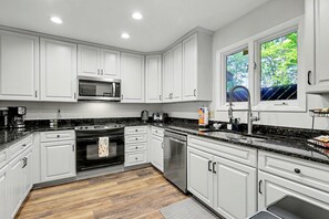 Fridge, microwave, oven, stovetop - Lakefront Stillwaters Villa w/Deck & Private Dock (Dadeville)