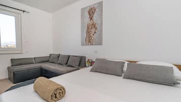 Family Apartment, Balcony, Sea View | Blackout drapes, iron/ironing board, free WiFi