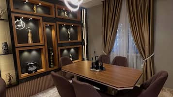 Family Room, Balcony, City View | Dining room