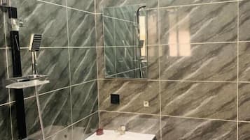 Deluxe Room, Balcony, City View | Bathroom | Free toiletries, hair dryer, towels, soap