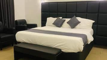 Deluxe Room, Balcony, City View | Desk, laptop workspace, blackout drapes, soundproofing