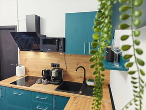 Studio Superior, balkon, pemandangan kota | Dapur pribadi | Mesin espresso, mesin pembuat kopi/teh, dan ketel listrik