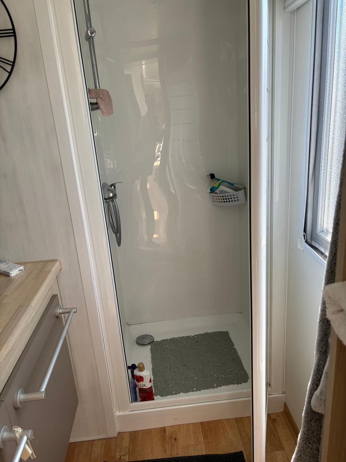 Shower, towels, soap, toilet paper