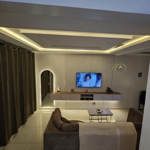 Living area - Modern 2BR Duplex Home with 24hrs Electricity, Unlimited Wi-Fi, Gym Pool access (Lekki)