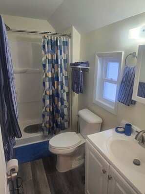 Shower, towels, soap, shampoo