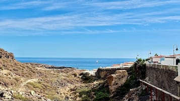 On the beach, sun loungers