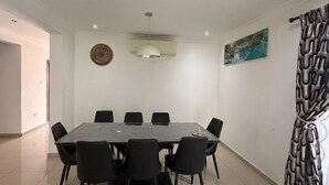 Family Apartment, Balcony, Garden View | In-room dining - 4BR Town House Cantonments. Pool. Garden (Accra)